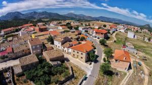 an aerial view of a village with mountains in the background at El Calar - Casas Rurales Luis in Moratalla