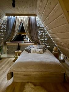 Postel nebo postele na pokoji v ubytování LaKris