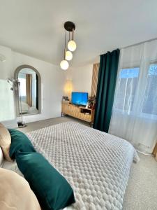 Postel nebo postele na pokoji v ubytování Guest House Rila