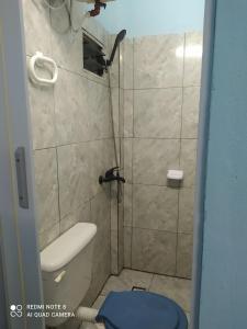 Et badeværelse på CASA CON PILETA Selecciona casa, Loft o pieza