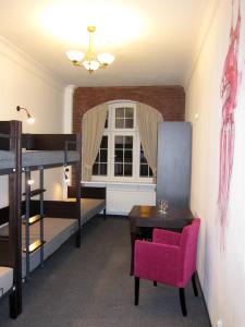 Posteľ alebo postele v izbe v ubytovaní Hostel Wratislavia