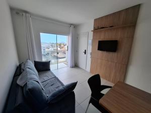 Et tv og/eller underholdning på Conforto e Mar em Navegantes SC