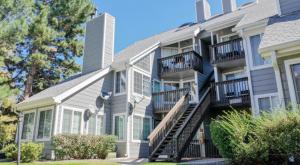 een groot huis met een trap ervoor bij Updated Two-Bedroom with Three King Beds Loft & Two Baths in Aurora