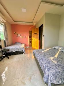 En eller flere senge i et værelse på Casa Paraíso do Sal + 9 billeder