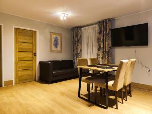 Et tv og/eller underholdning på Domki OSiR - centrum, parking