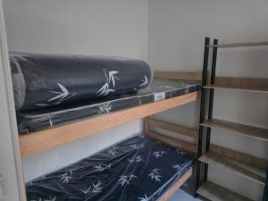 Μία ή περισσότερες κουκέτες σε δωμάτιο στο Residencial S A Canasvieiras