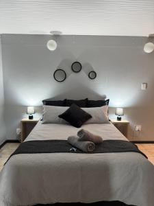 En eller flere senge i et værelse på Worcester Cozy Stay Apartments