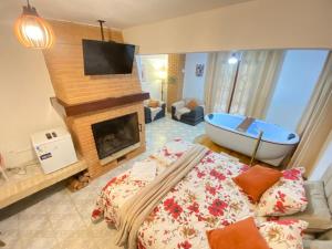 En eller flere senge i et værelse på Villaggio Farnese