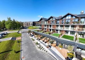 an aerial view of a building with a courtyard at Laguna Beskidów Resort - Desert Spring in Zarzecze