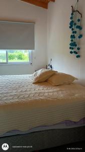 Postel nebo postele na pokoji v ubytování Golondrinas + 29 fotografií