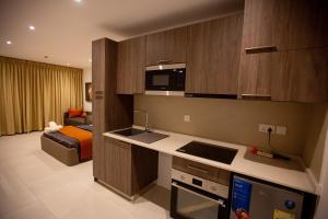 Η κουζίνα ή μικρή κουζίνα στο Global Ease