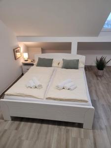 Ένα ή περισσότερα κρεβάτια σε δωμάτιο στο Beosan