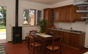 Kuchyň nebo kuchyňský kout v ubytování Agriturismo San Luigi