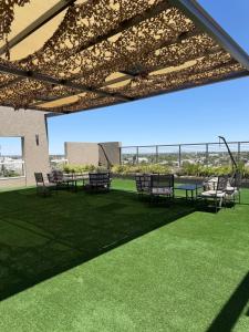 En have udenfor Moderno departamento, pileta, parrilla, gimnasio EXCELENTE UBICACIÓN