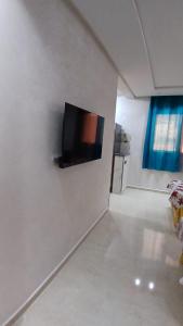 TV a/nebo společenská místnost v ubytování L'étoile de Tamraght