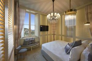 Et tv og/eller underholdning på Nuvole Garden Hotel