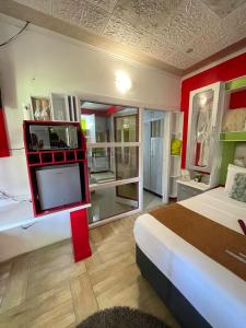 Ένα ή περισσότερα κρεβάτια σε δωμάτιο στο Ngami Gates Boutiqúe Guesthouse +24 φωτογραφίες