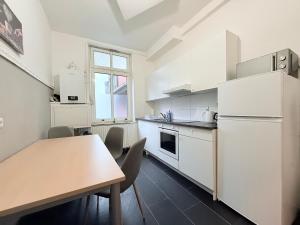 Kuchyň nebo kuchyňský kout v ubytování Business-Apartments Neumünster Zentrum