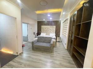 Postel nebo postele na pokoji v ubytování IlewaLekkiLagos