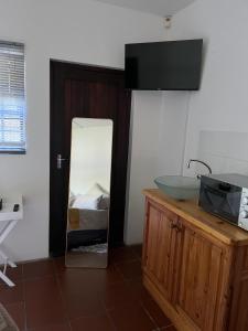 Kuchyň nebo kuchyňský kout v ubytování Repose guest house 4 + 4 fotografie