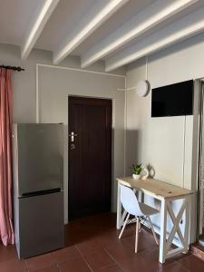 TV a/nebo společenská místnost v ubytování Repose guest house 4