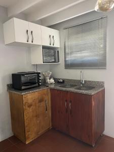 Kuchyň nebo kuchyňský kout v ubytování Repose guest house 4