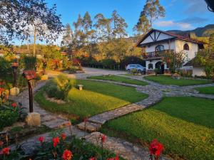 Κήπος έξω από το Hotel Villa de Paris