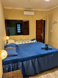 En eller flere senge i et værelse på Pousada Escape + 78 billeder