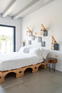 Ένα ή περισσότερα κρεβάτια σε δωμάτιο στο B&B Panevì