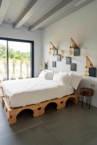 Postel nebo postele na pokoji v ubytování B&B Panevì