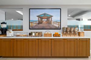 a kitchen with a picture of a pier at SpringHill Suites Boca Raton in Boca Raton