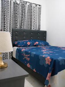 Ένα ή περισσότερα κρεβάτια σε δωμάτιο στο Apartamento en Cali Ubicación Perfecta