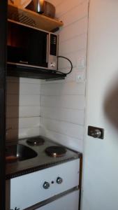 Kuchyň nebo kuchyňský kout v ubytování Résidence Nova - Studio pour 2 Personnes MAE-1233