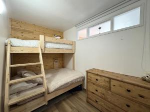 Ένα ή περισσότερα κρεβάτια σε δωμάτιο στο Résidence Le Seignon - Résidence Seignon, centre station MAE-7273