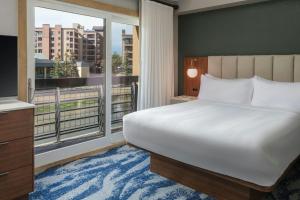 a bedroom with a large bed and a large window at Marriott's Mountain Valley Lodge at Breckenridge in Breckenridge +32 photos