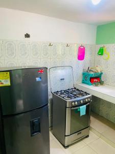 Køkken eller tekøkken på Hostal Santa Maria City