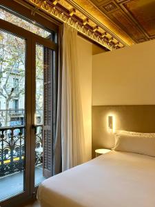 Postel nebo postele na pokoji v ubytování Storni Barcelona + 54 fotografií