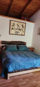 Postel nebo postele na pokoji v ubytování CASA CON PLAYA PUCURA + 4 fotografie