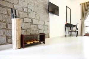 TV a/nebo společenská místnost v ubytování Madagui Forest City