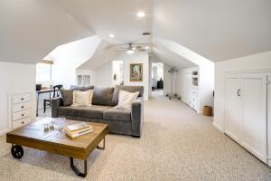 a living room with a couch and a coffee table at Spacious Riverside Farmhouse, Perfectly Located in Edgemont +30 photos