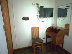 Μια τηλεόραση ή/και κέντρο ψυχαγωγίας στο Hostal Entre Termas y Lagos