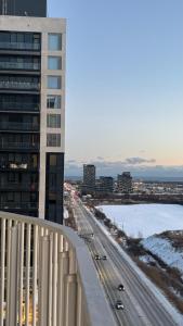 a view of a highway from the balcony of a building at Trafalgar in Oakville +29 photos
