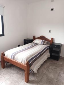 En eller flere senge i et værelse på Departamento Privado y Equipado en Planta Alta