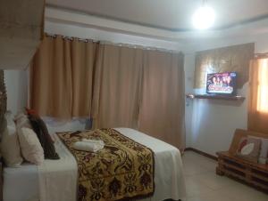 En eller flere senge i et værelse på Ubaia flet