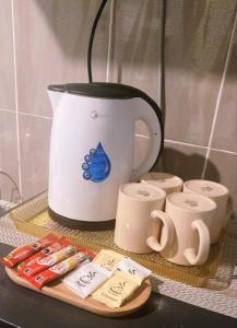 Kaffe- og tefaciliteter på IRONMAN HomeStay + 6 billeder