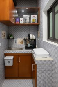 Kuchyň nebo kuchyňský kout v ubytování Studio meublé angre chu