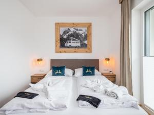 En eller flere senge i et værelse på Ski Nature Apartment Lungau Top 6
