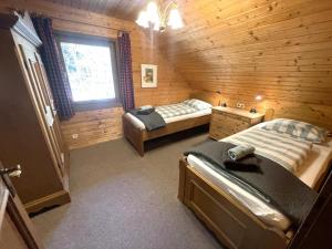 Кровать или кровати в номере Mooshausl