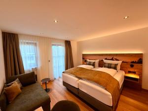 Postel nebo postele na pokoji v ubytování Gasthof Und Hotel Maria Gern