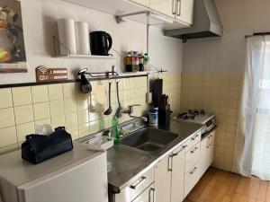 Kuchyň nebo kuchyňský kout v ubytování happy stay華 Kagawa Sakaide 1 Building Private 6 Guests Free